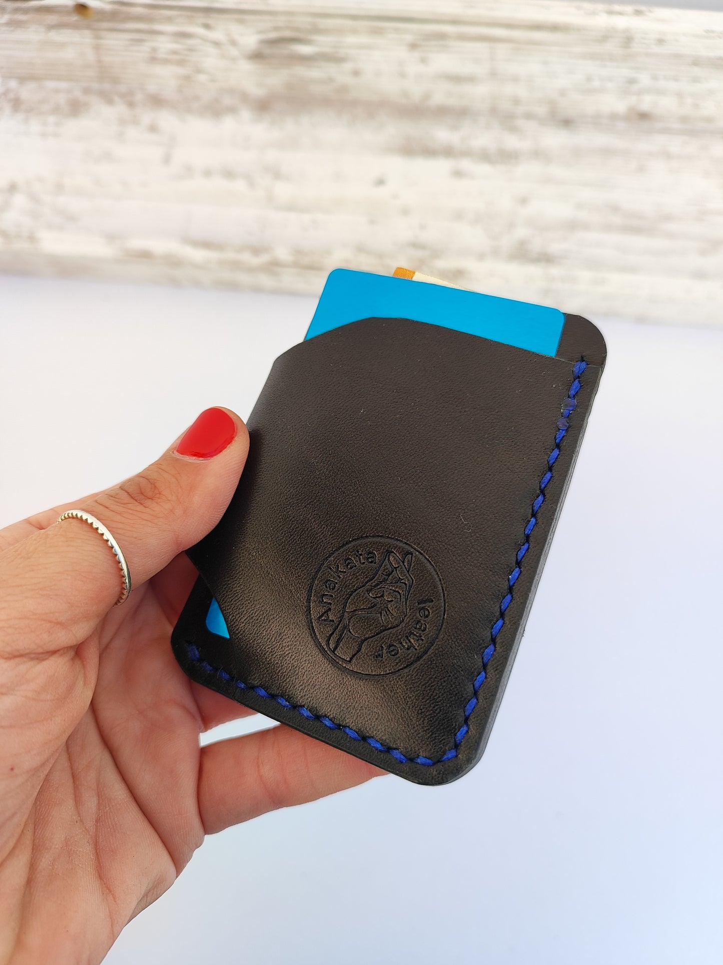 Hobbit δερμάτινο πορτοφόλι ''μαύρο με μπλε κλωστή''